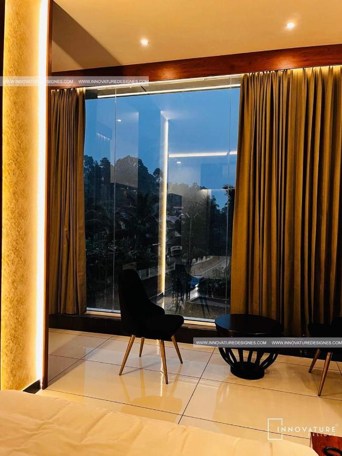 Hotel 24Inn Residency Pathanāmthitta Exteriör bild